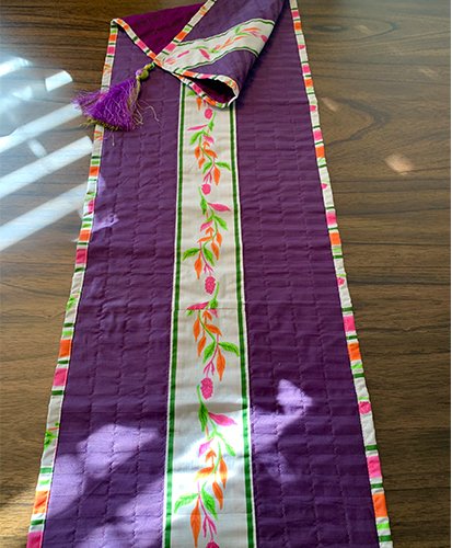 Revive – Embroidered Table Runner in Cotton with Tassels